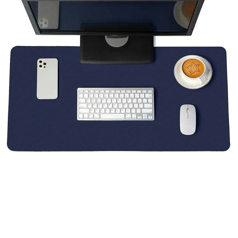 PU Leather Desk Mat in navy blue, 35.4 by 17.7 inches (90 by 45 cm), shown from above on a white background