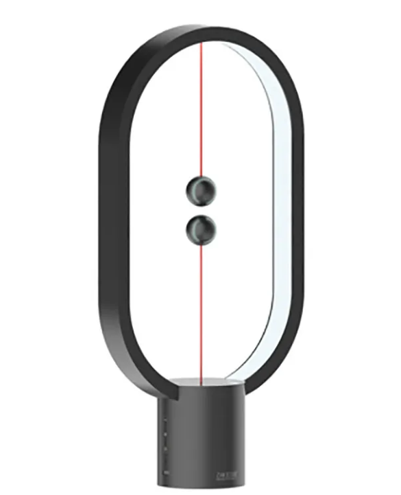 Magnetic Balance Desk Lamp in black with its two magnetic balls